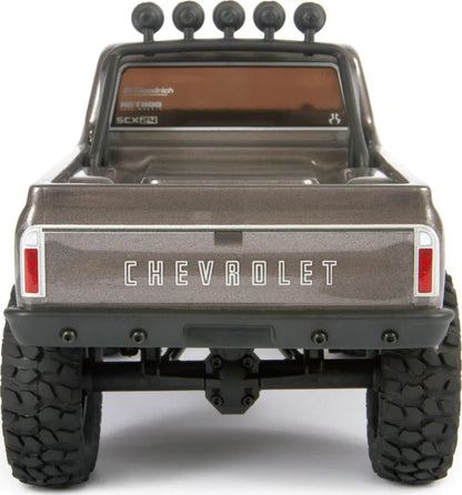 شاحنة شيفروليه C10 رباعية الدفع SCX24 موديل 1967 من Axial Racing، مصقولة، RTR، فضية اللون