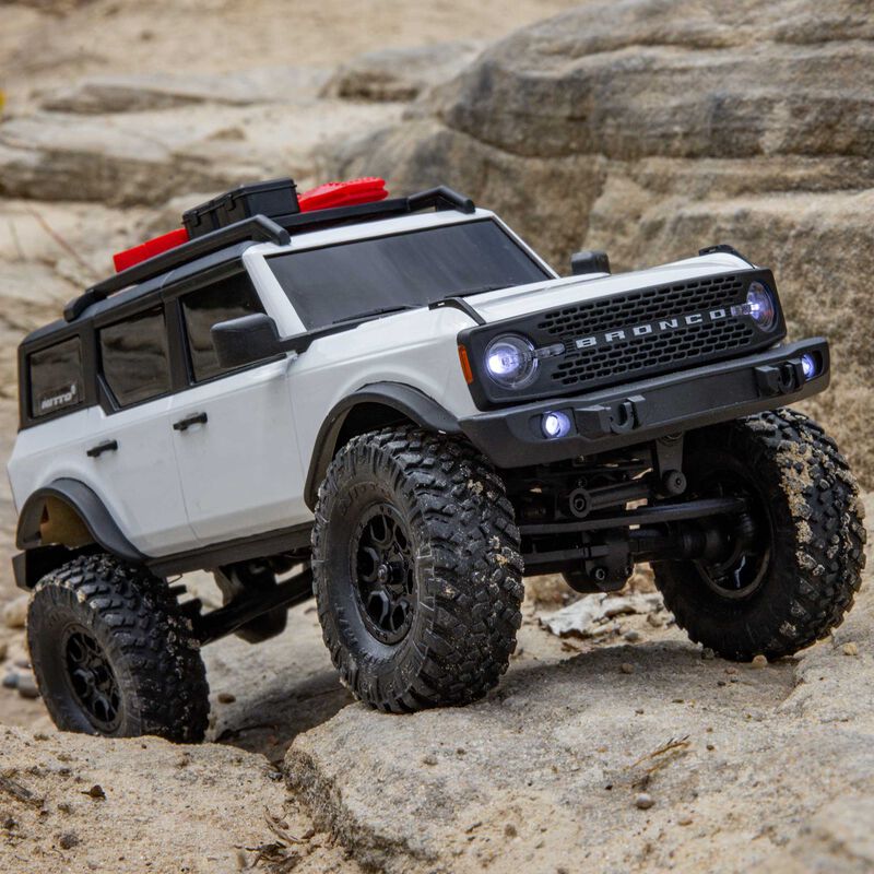 سيارة فورد برونكو 4X4 RTR SCX24 محورية بمقياس 1/24 (أبيض)